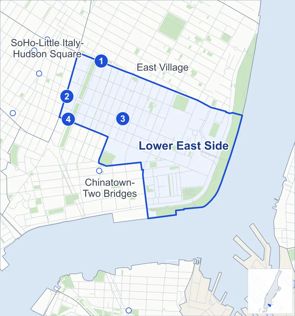 Street map of Lower East Side, Manhattan, outlined among Chinatown-Two Bridges, the East Village and SoHo-Little Italy-Hudson Square, with its four subway stations and John V. Lindsay East River Park.